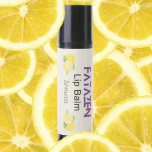 FATAZEN Lemon Lip Balm tube against sliced lemons