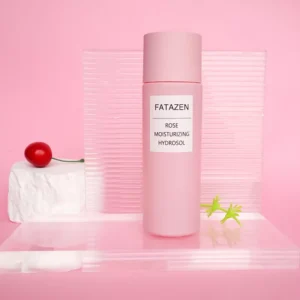 FATAZEN Rose Hydrosol bottle on a pink display with rose-inspired props